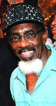 NEW SONG: Calypso Monarch Dr Hollis "Chalkdust" Liverpool after being crowned at the Dimanche Gras show early yesterday morning at the Queen's Park Savannah, Port of Spain. chalkdust