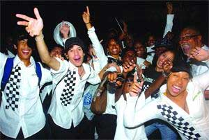 champions: Members of Silver Stars Steel Orchestra celebrate their first victory in the National Panorama Final, Conventional Large Bands category, playing the Edwin Pouchet/Alvin Daniell composition of "First In De Line" at the Queen's Park Savannah on Saturday night. champions