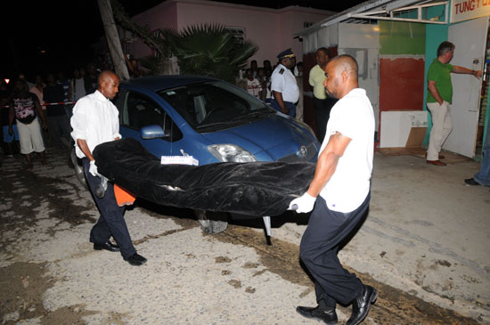 Body of slain victim taken away. bibi