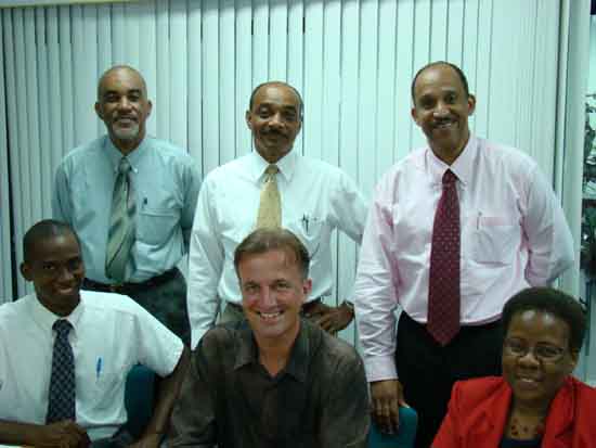 The new CARS agreement was signed by: l-r sitting, Alex Maynard of New India, Guy George of ENNIA, Linda Moise of Fatum. Standing left to right are Henry Ellis of CARS, Franklyn Patrick of GULF and Eric Ellis of NAGICO , also Chairman of the local branch of the Netherland Antilles Insurance Association (NAVV). roadside