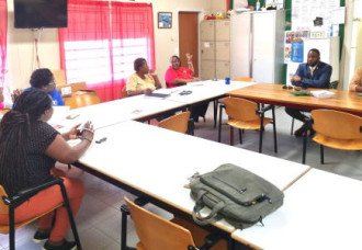 Minister Lewis visits Ruby Labega School to assess heat situation.