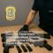 Customs Department intercepts illegal firearms during routine shipment inspection. 