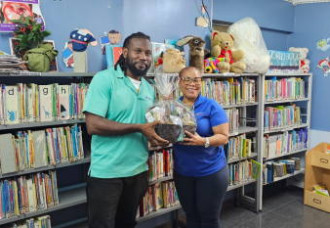 Daniel Helligar Celebrates 15 Years of Dedicated Service with the Sint Maarten Library.