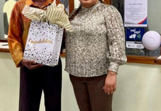 Finance Minister Gumbs pays tribute to Cedric Kirindongo on his 35 Years at Postal Services St. Maarten N.V.