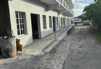 Residents of Man Jack Road Demand Road Repairs Amid Controversy.