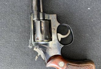 Male Suspect Arrested for Illegal Firearm Possession.