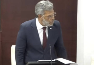 Prime Minister defends decisions, rejects allegations during heated parliamentary session.